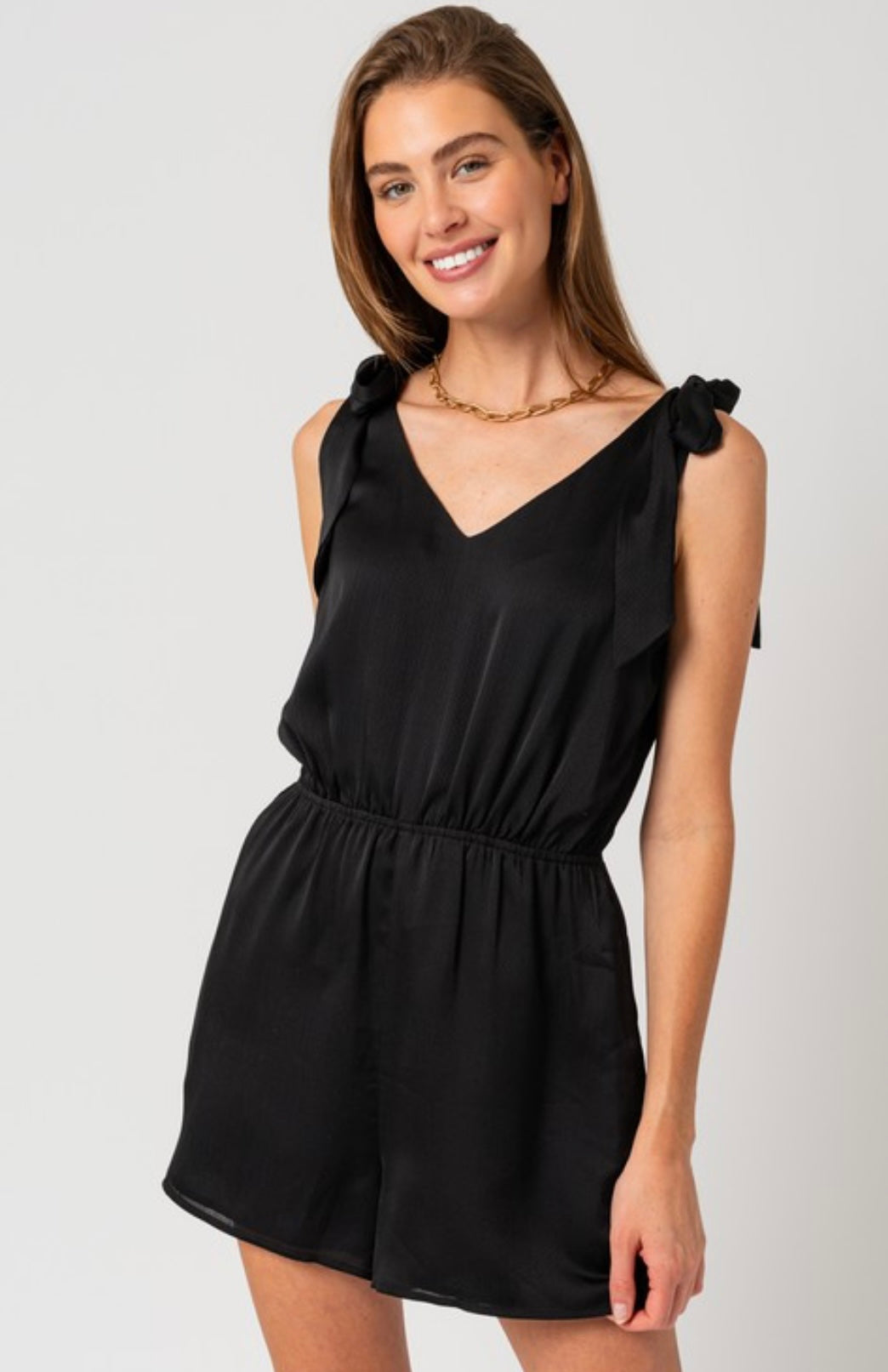 Little Black Romper – The Boutique at Peach Park